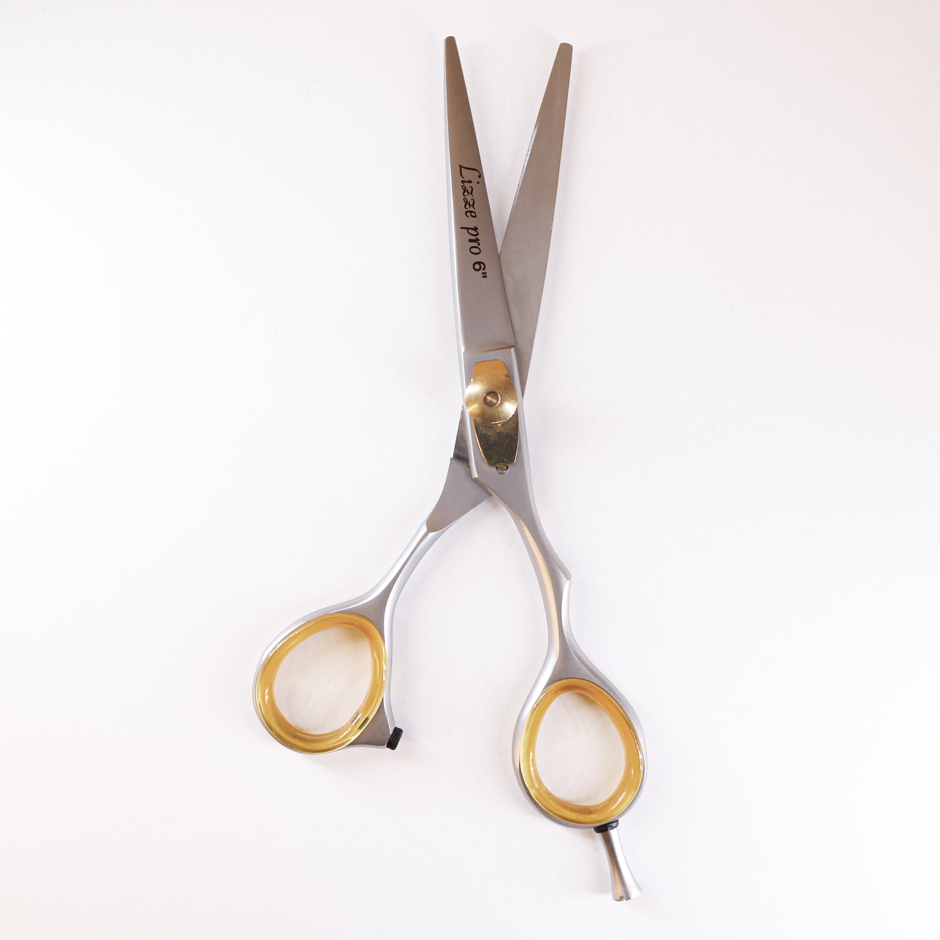 Lizze Pro 6-inch hairdressing scissors for precision cutting and professional hairstyling.