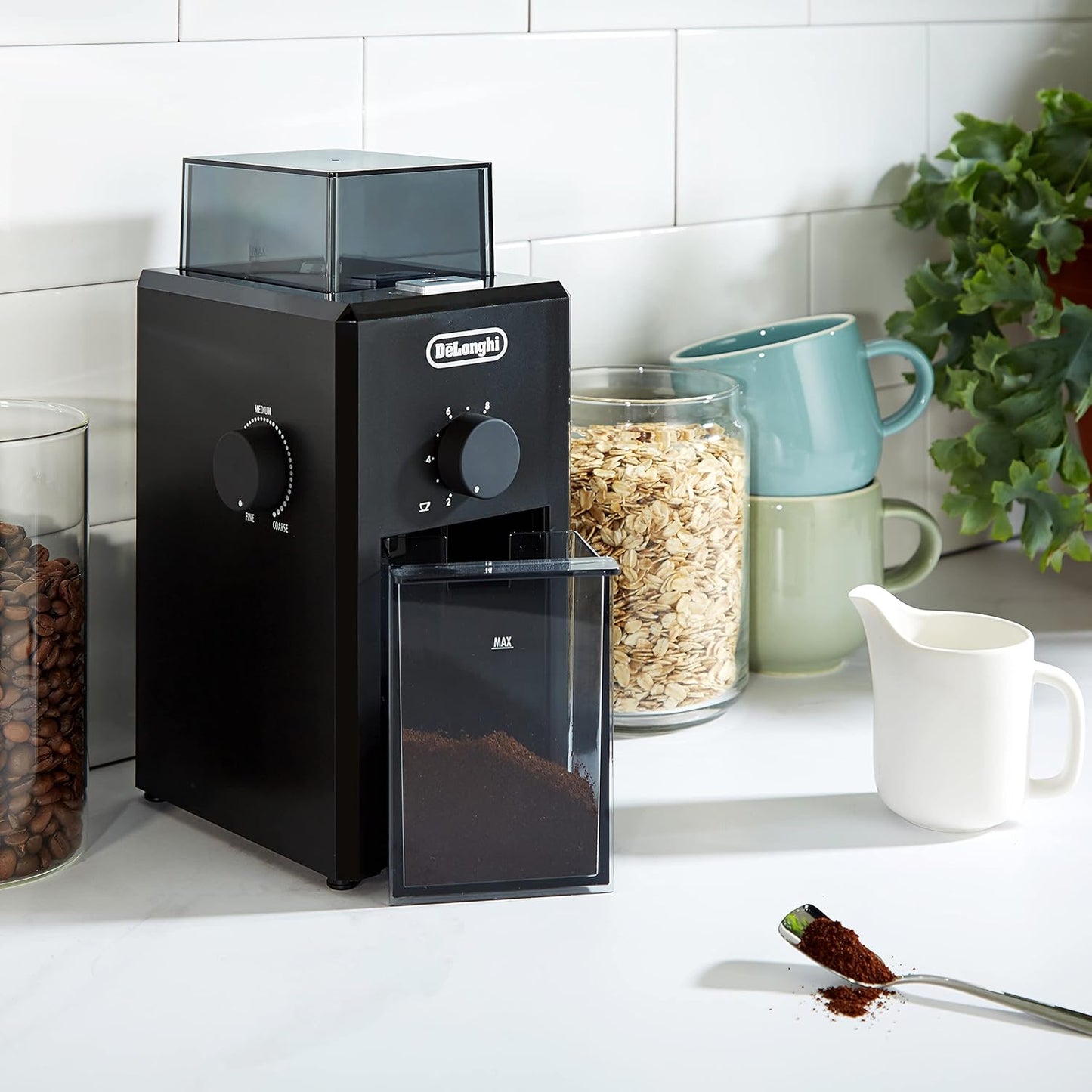 De'Longhi Electric Coffee Grinder, 110W, Burr Grinding System, 12 Settings, Stainless Steel Blade, 12 Cup Capacity, 120g Bean Container, Removable Transparent Lid – KG79, Black