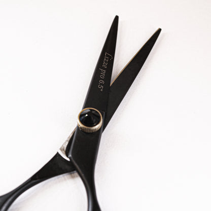 Lizze Pro 6.5-inch black and gold professional hairdressing scissors for precision cutting.