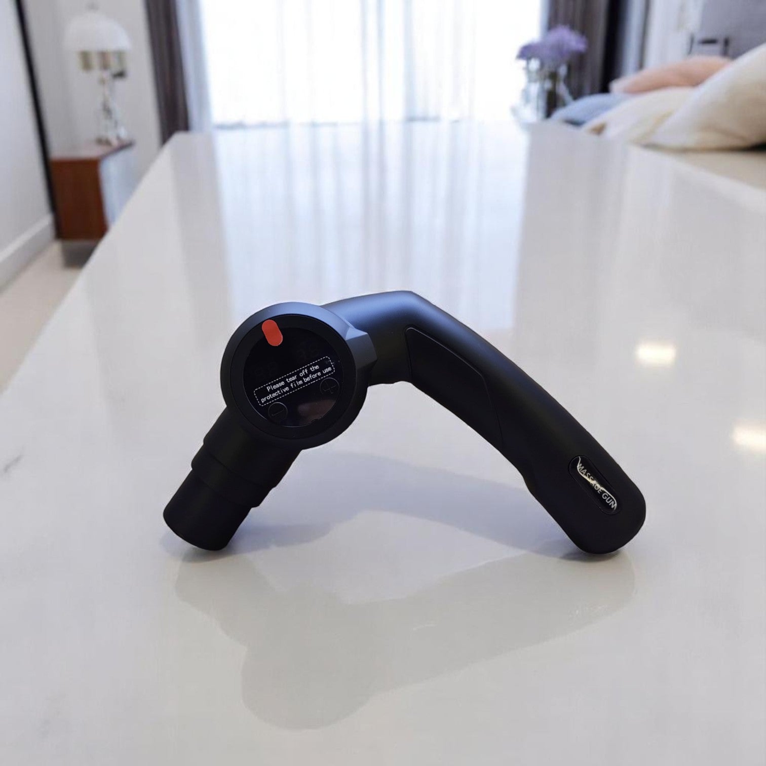 Massage gun in use on arm after gym session